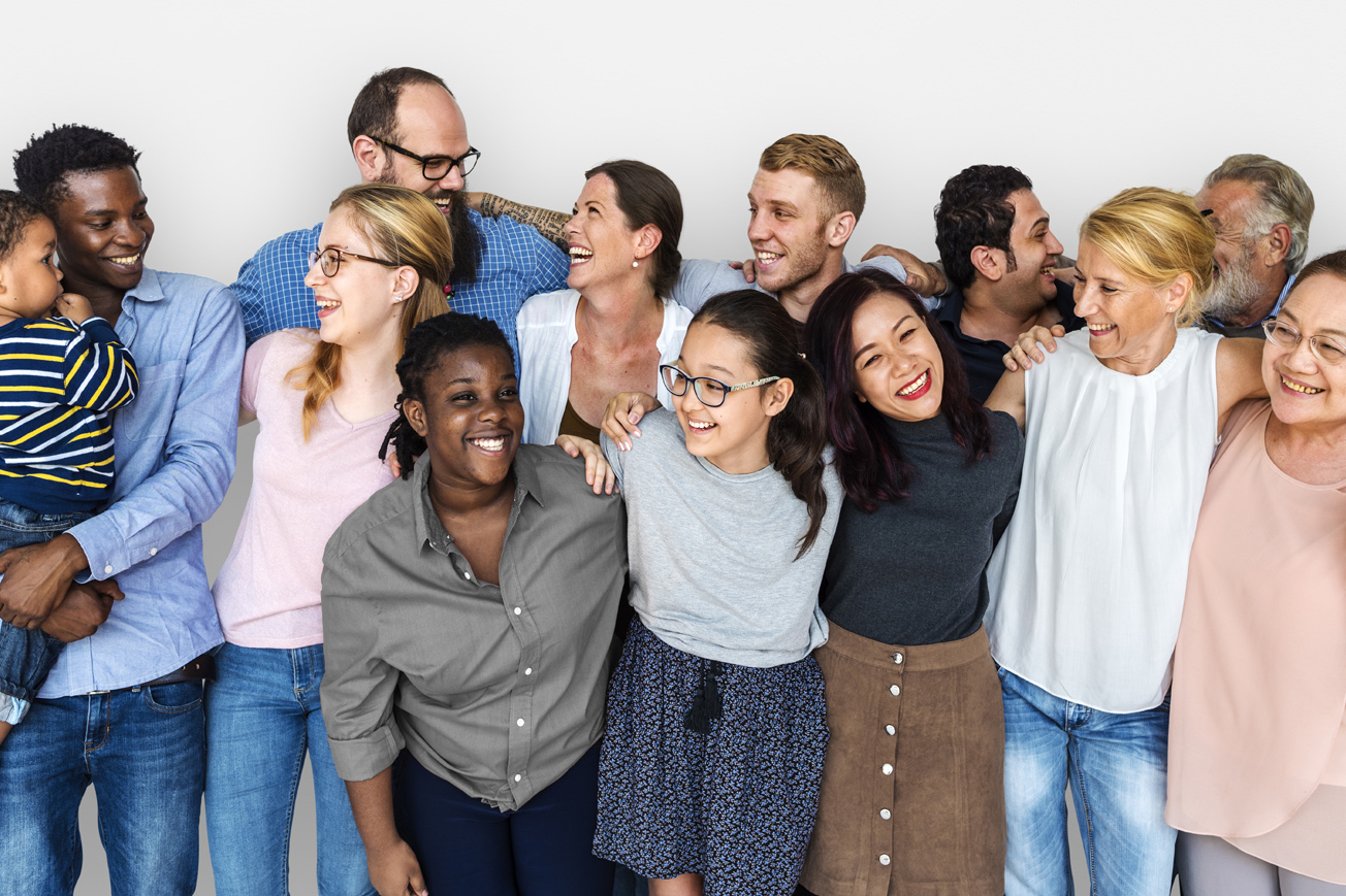 A group of people hugging together on a white background.