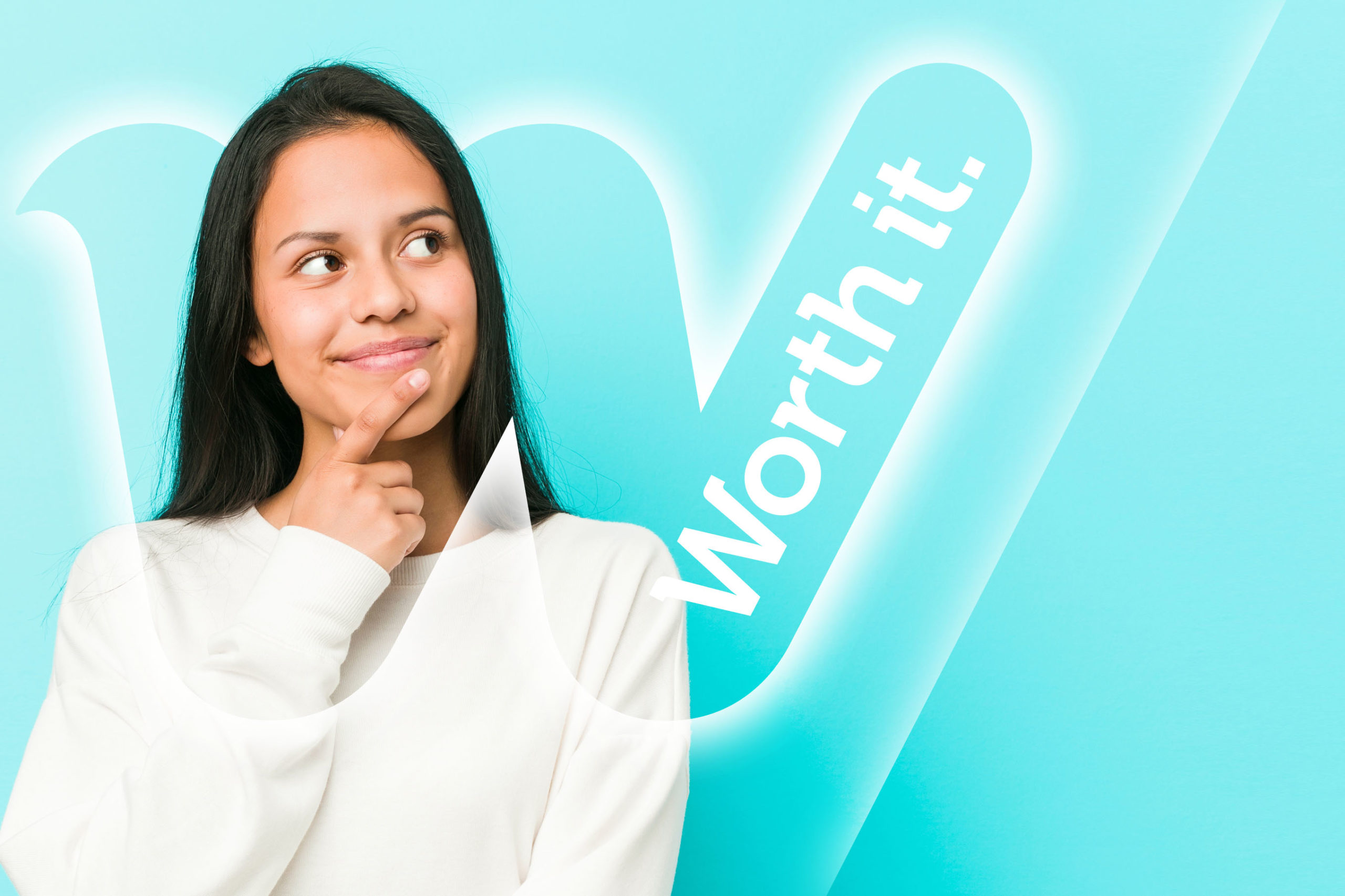 A young woman looking at the word worth it on a blue background.